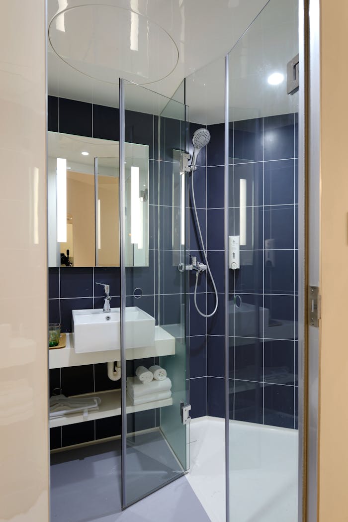The Art of Drawing Readers In: Your attractive post title goes here Sleek modern bathroom with a glass shower and contemporary design elements.